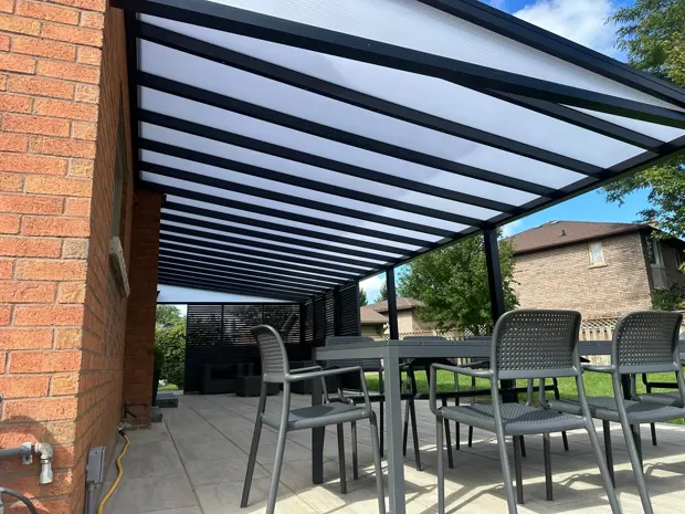 Pergola framing above an outdoor dining table