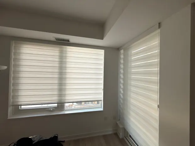Shades in a bright corner room