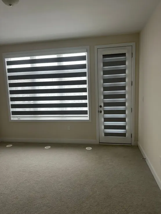 Layered shades fitted inside a window